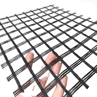 La fibre de verre biaxiale Geogrid bavardent la maille de renfort résistante d'alcali de réparation de route de Bitume